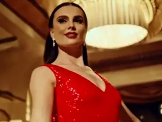 A hottie shows her tight red dress